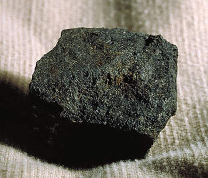 Coal: Combustible sedimentary rock composed primarily of carbon