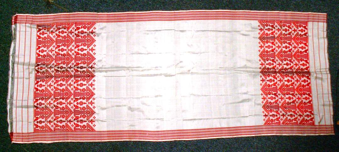 Gamosa: Woven rectangular textile of Assam, India, used for various purposes
