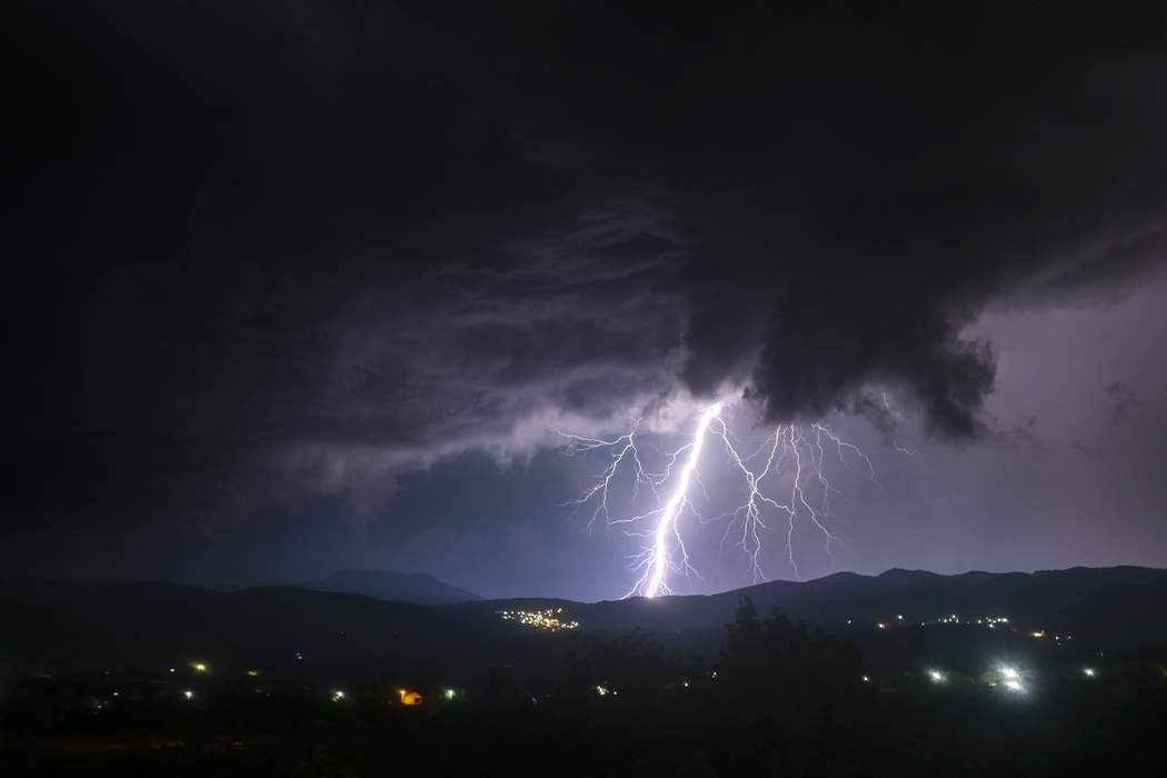 Lightning strike: Electric discharge between the atmosphere and the ground