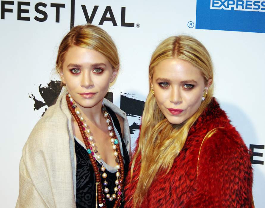 Mary-Kate and Ashley Olsen: American child actresses and fashion designers (born 1986)