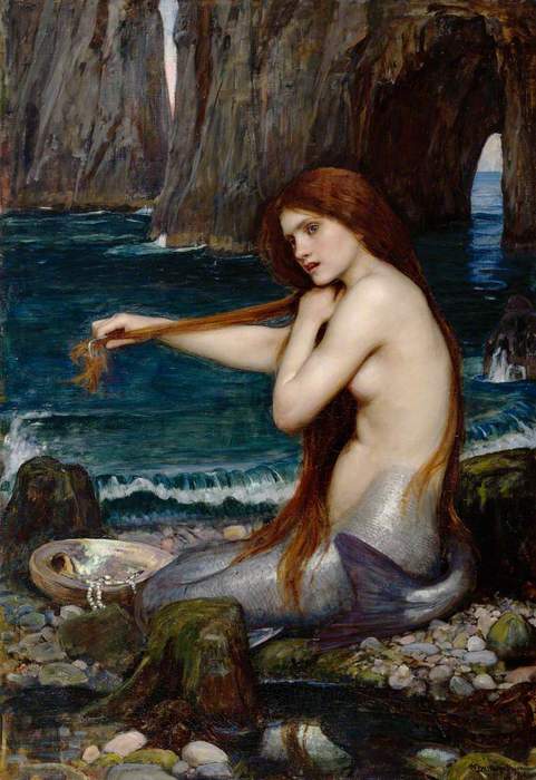 Mermaid: Legendary aquatic creature with an upper body in human female form