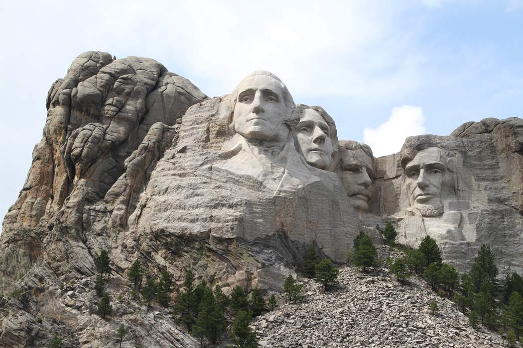 Mount Rushmore: Mountain in the US featuring a sculpture of four presidents