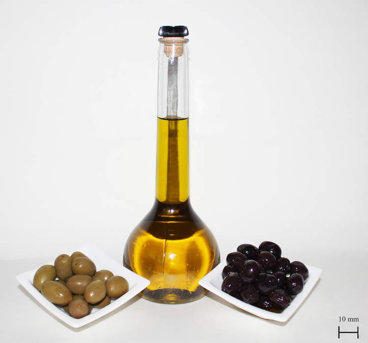 Olive oil: Liquid fat extracted by pressing olives