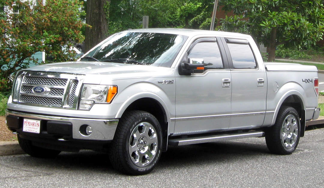 Pickup truck: Light-duty truck with an enclosed cab and an open cargo area
