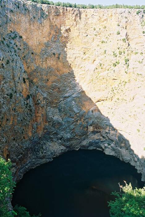 Sinkhole: Geologically-formed topological depression