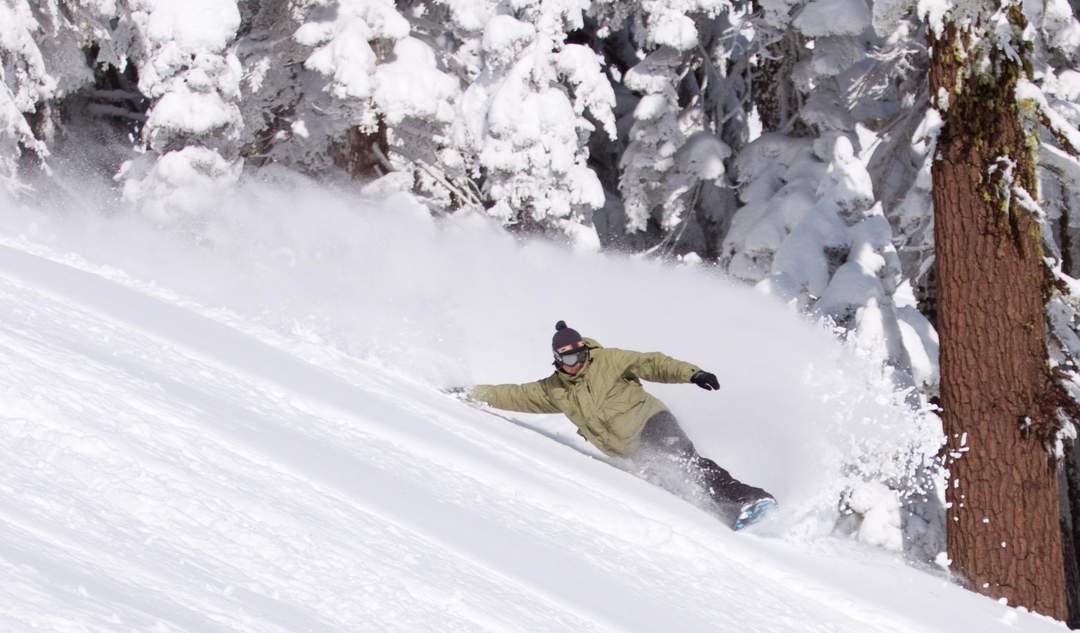 Snowboarding: Snow sport involving a single board