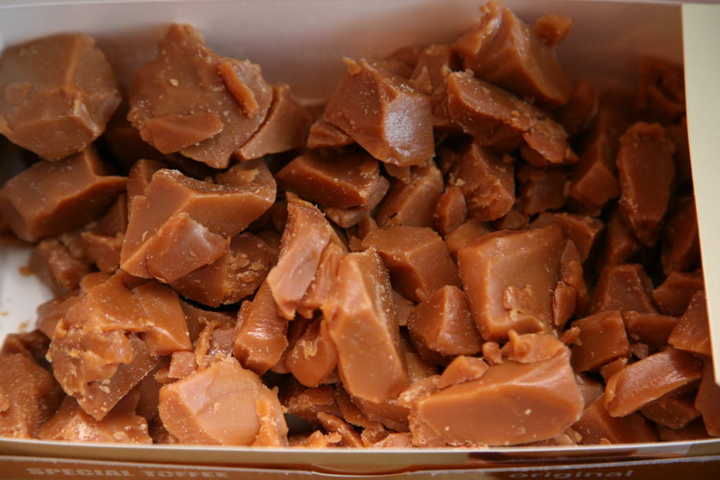 Toffee: Confection made by caramelizing sugar or molasses along with butter and flour