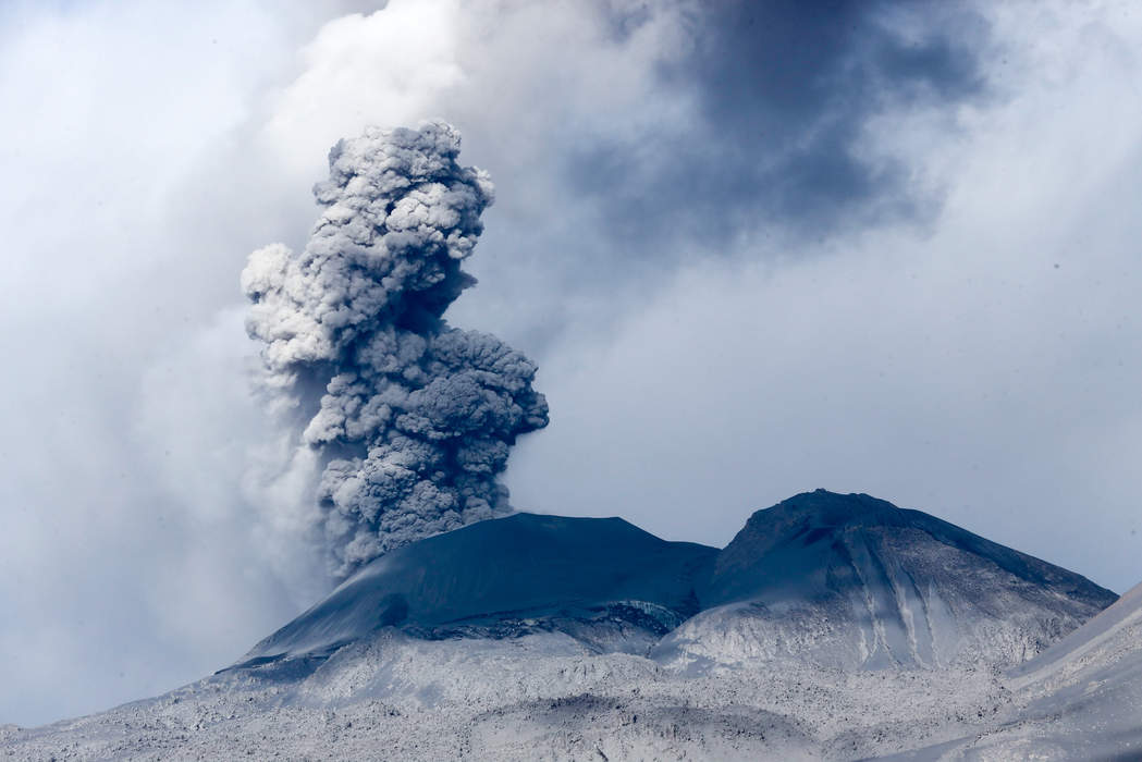 Volcano: Rupture in a planet's crust where material escapes
