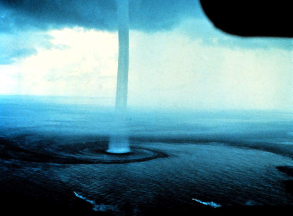 Waterspout: Tornado occurring over a body of water